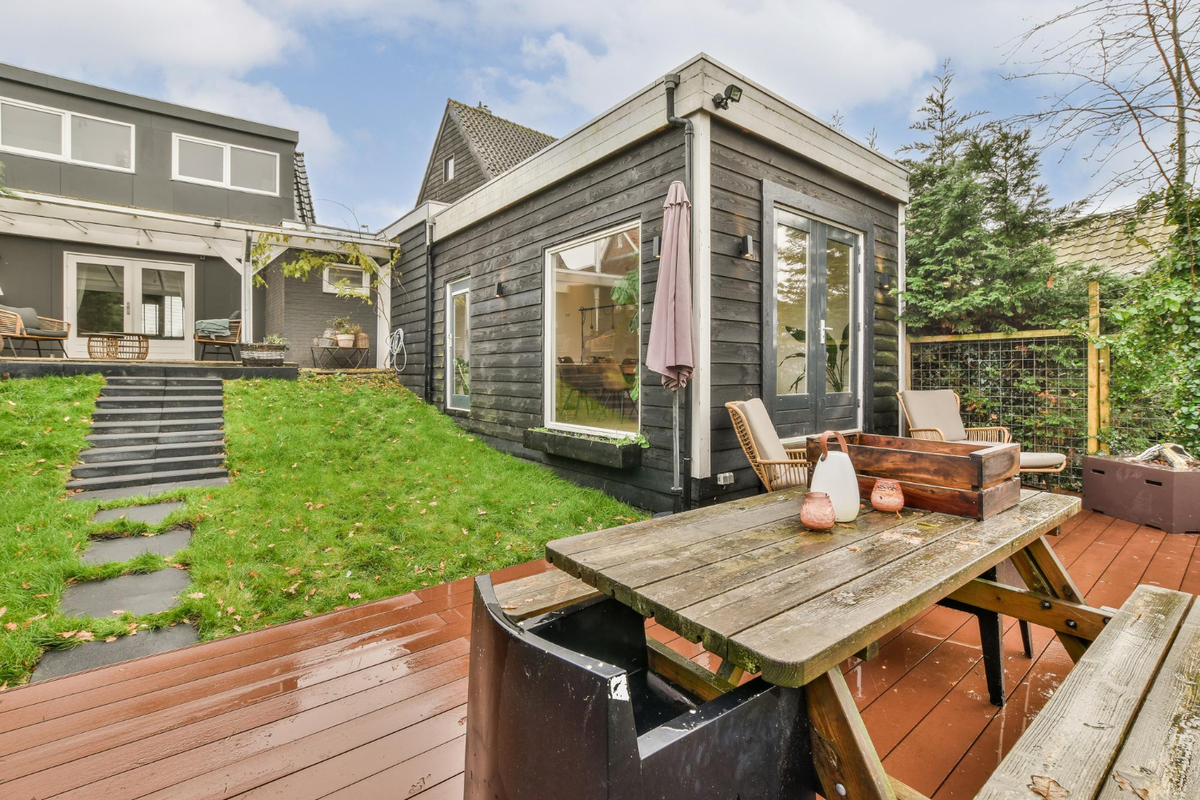 Backyard ADU connected to main house with deck – Mister ADU